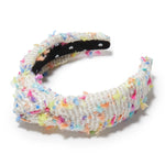 The "Rainbow Confetti Boucle" Headband by Lele Sadoughi