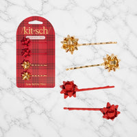 Kitsch Gift Bow Bobby Pins on white marble