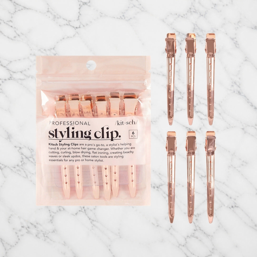 Kitsch Rose Gold Styling Clips on white marble
