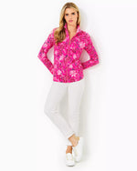 The "Passion Fruit Pink Giraffic Park" UPF 50+ Leona Zip-Up Jacket by Lilly Pulitzer