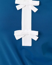 The "Starlight Navy" UPF 50+ Luxletic Frida Sleeveless Bow Polo by Lilly Pulitzer