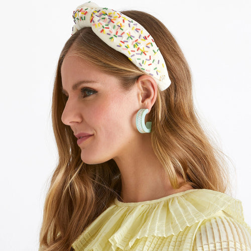 The "Buttercream Birthday Sprinkles" Headband by Lele Sadoughi