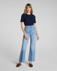 The "Seaside Blue" SPANXshape® Authentic 360 Raw Hem Kick Flare Jeans by SPANX