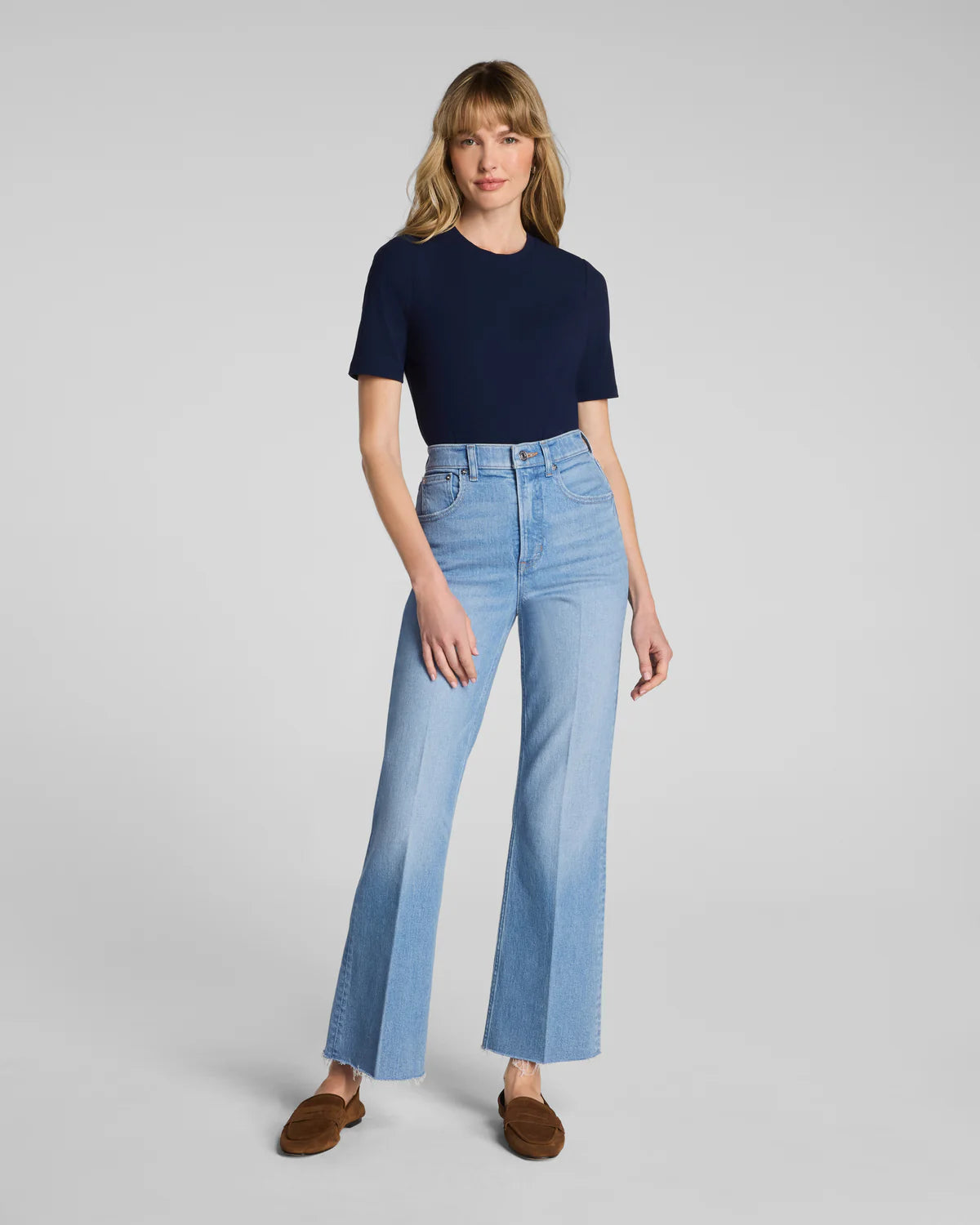 The "Seaside Blue" SPANXshape® Authentic 360 Raw Hem Kick Flare Jeans by SPANX