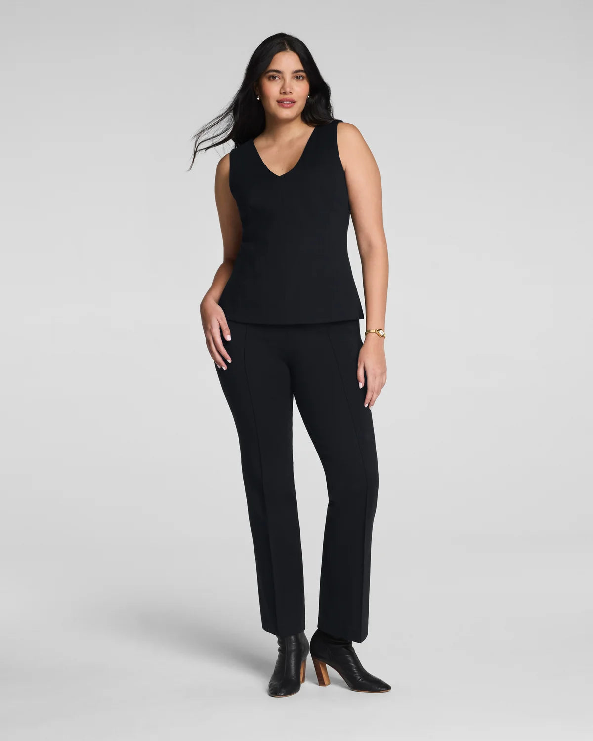 The "Classic Black" SPANXsupersmooth® PerfectFit Ponte Kick Flare Pant with Pintuck by SPANX
