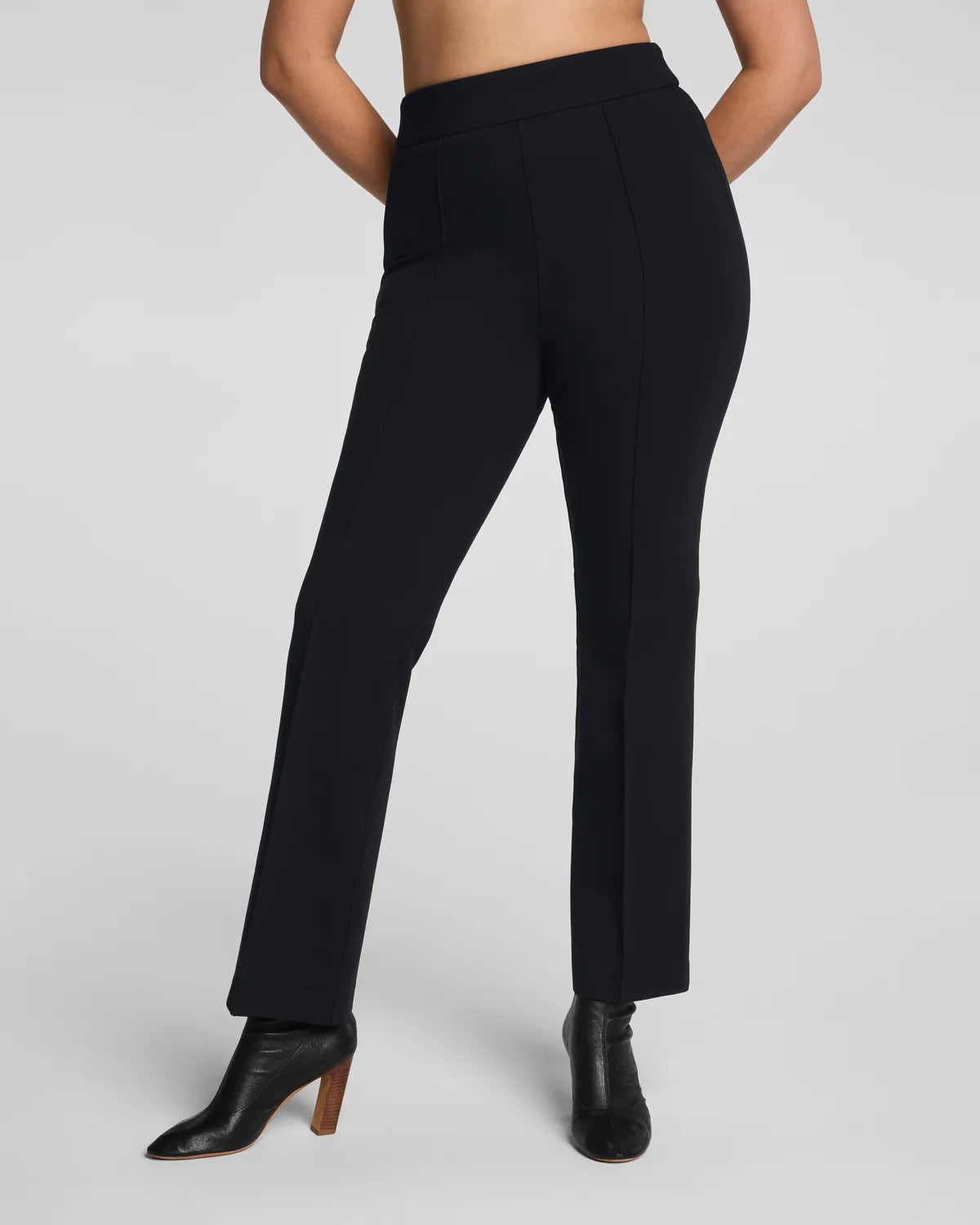 The "Classic Black" SPANXsupersmooth® PerfectFit Ponte Kick Flare Pant with Pintuck by SPANX