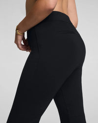 The "Classic Black" SPANXsupersmooth® PerfectFit Ponte Kick Flare Pant with Pintuck by SPANX