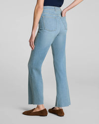 The "Seaside Blue" SPANXshape® Authentic 360 Raw Hem Kick Flare Jeans by SPANX