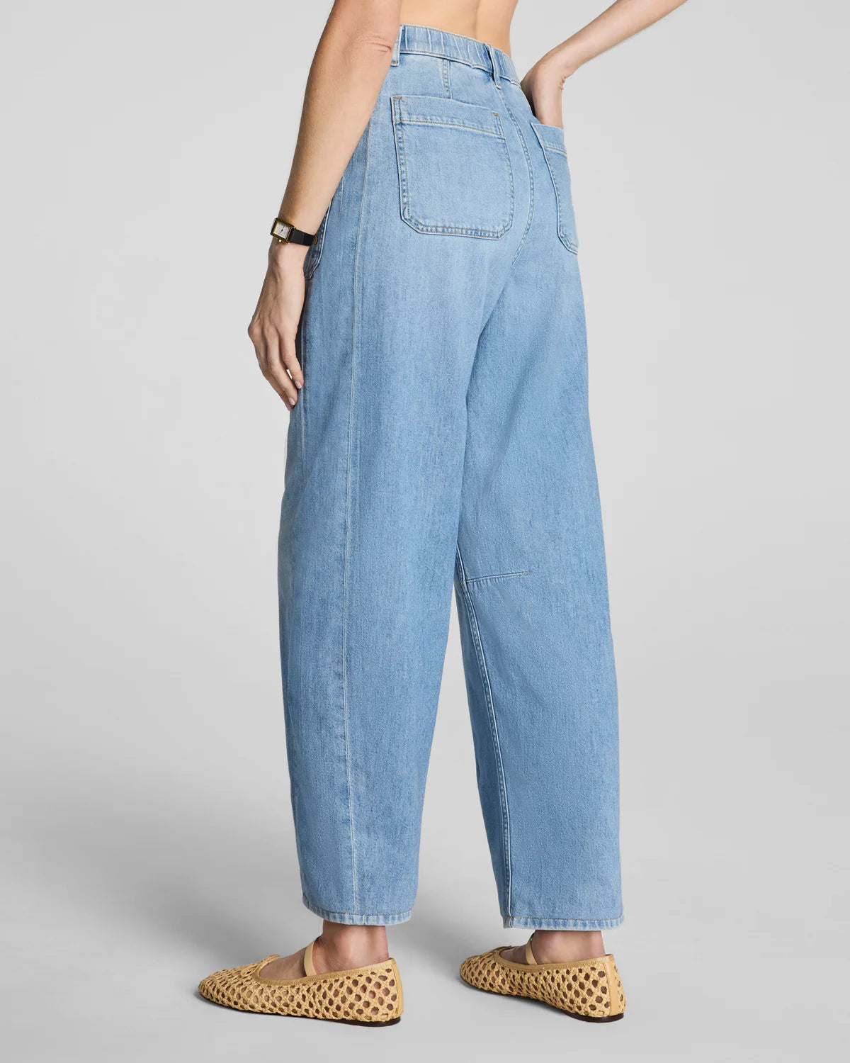 The "Seaside Blue" SPANXsupersmooth® Authentic 360 Lightweight Utility Barrel Leg Jeans by SPANX