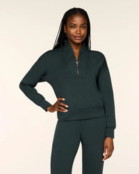 The "Night Forest Heather" SPANX AirEssentials® Shawl Collar Half Zip by SPANX
