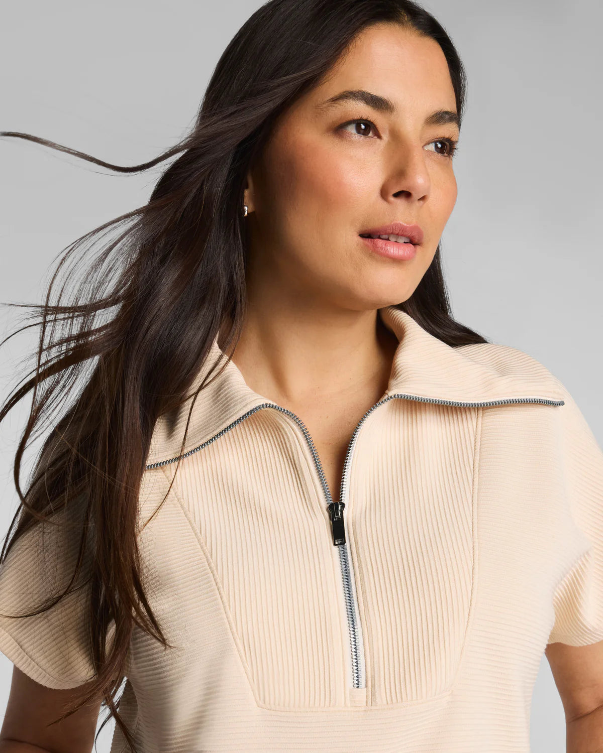 The "Toasted Coconut" SPANX AirEssentials® French Rib Short Sleeve Half Zip by SPANX