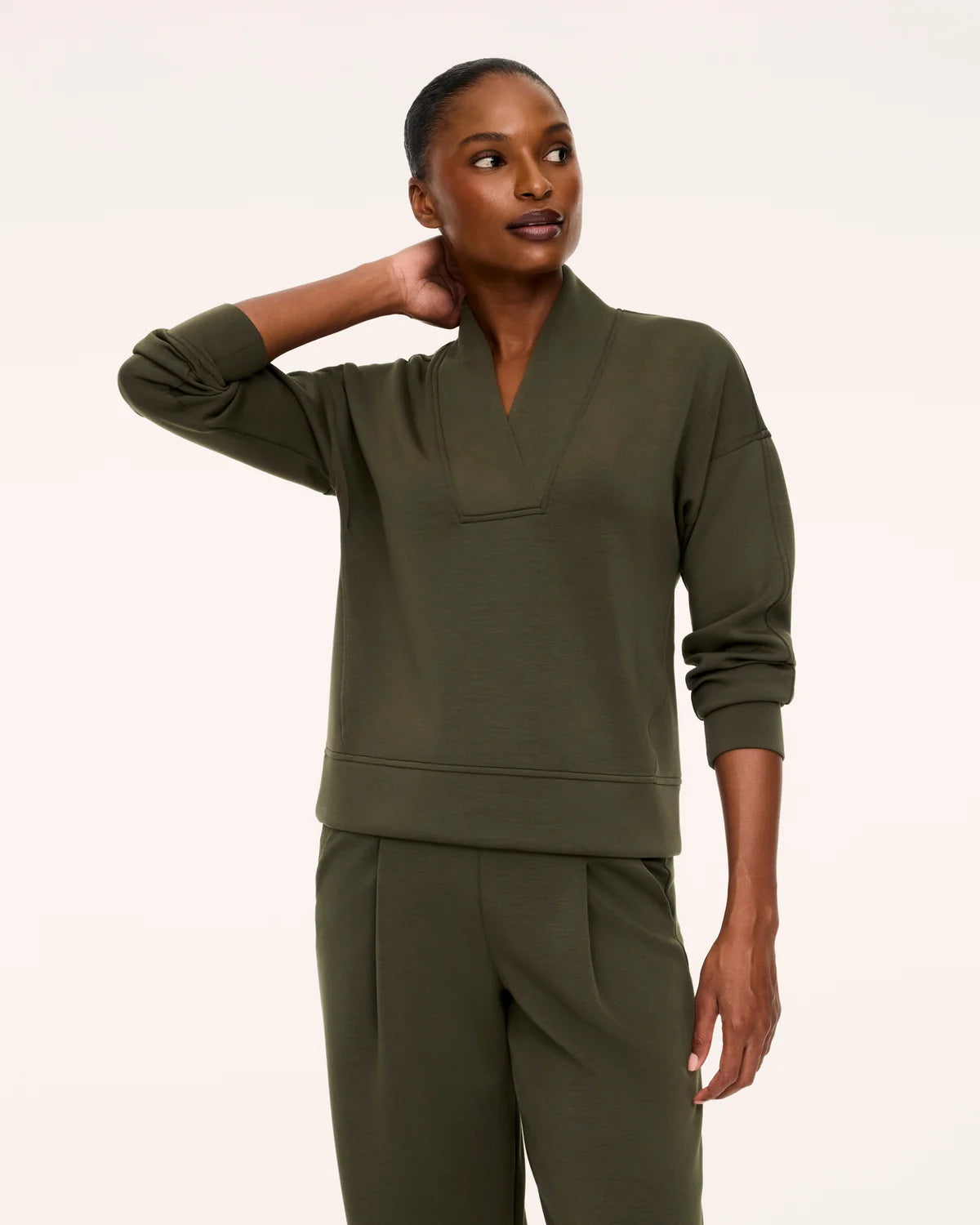 The "Monastera" AirEssentials® V-Neck Long Sleeve Top by SPANX