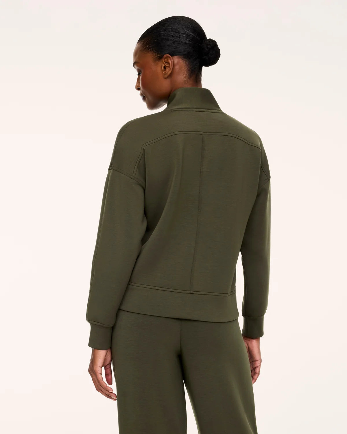 The "Monastera" AirEssentials® V-Neck Long Sleeve Top by SPANX