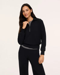 The "Very Black" SPANX AirEssentials® Half Zip by SPANX