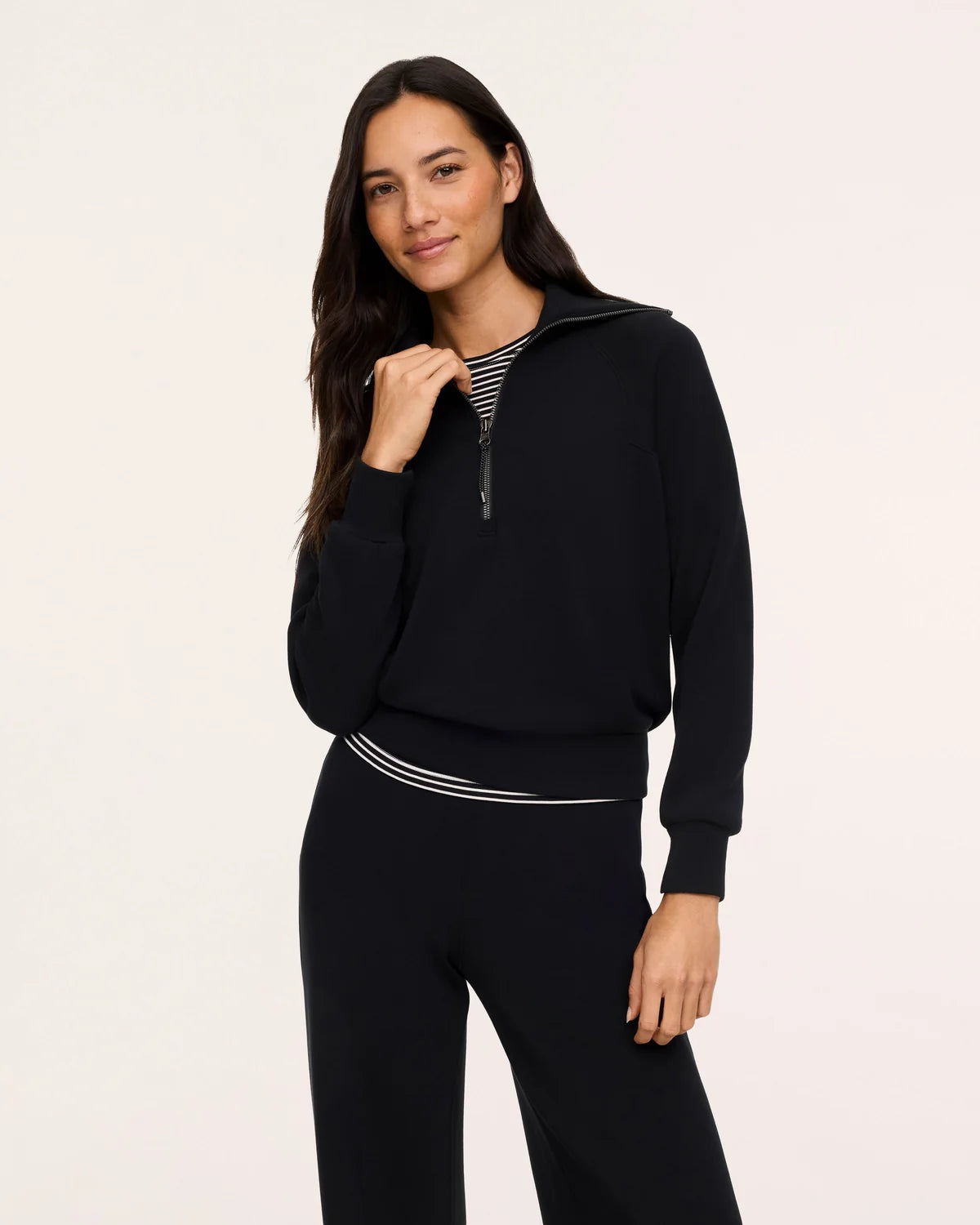 The "Very Black" SPANX AirEssentials® Half Zip by SPANX