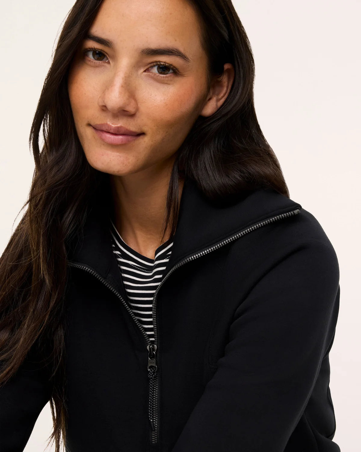 The "Very Black" SPANX AirEssentials® Half Zip by SPANX