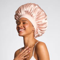 Kitsch Oversized Satin Bonnet in Blush worn