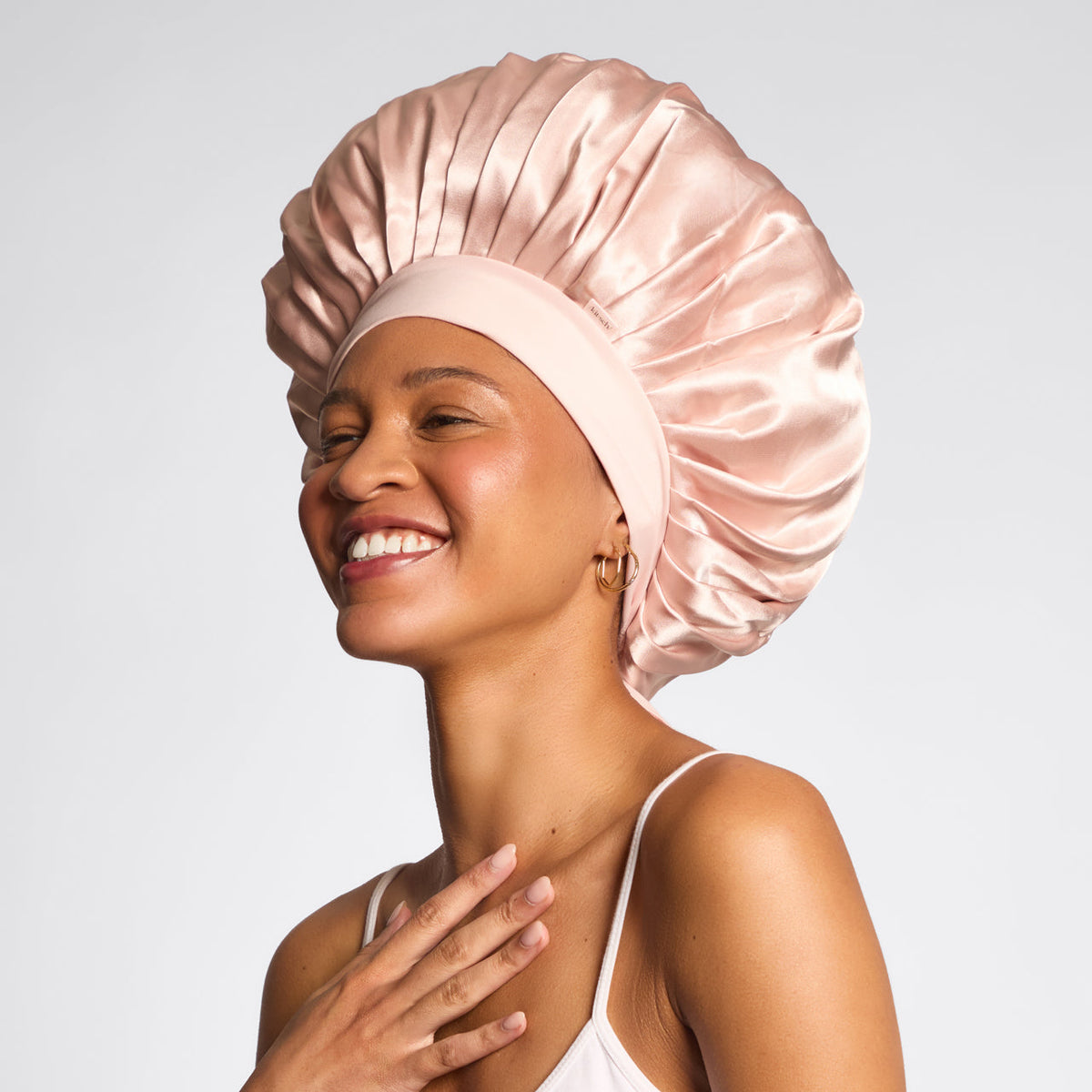 Kitsch Oversized Satin Bonnet in Blush worn