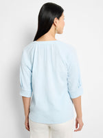 The "Pale Sky" Crinkle Knit Café Top by NIC+ZOE