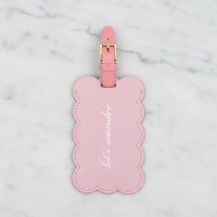 The "Let's Wander" Luggage Tag by Kate Spade